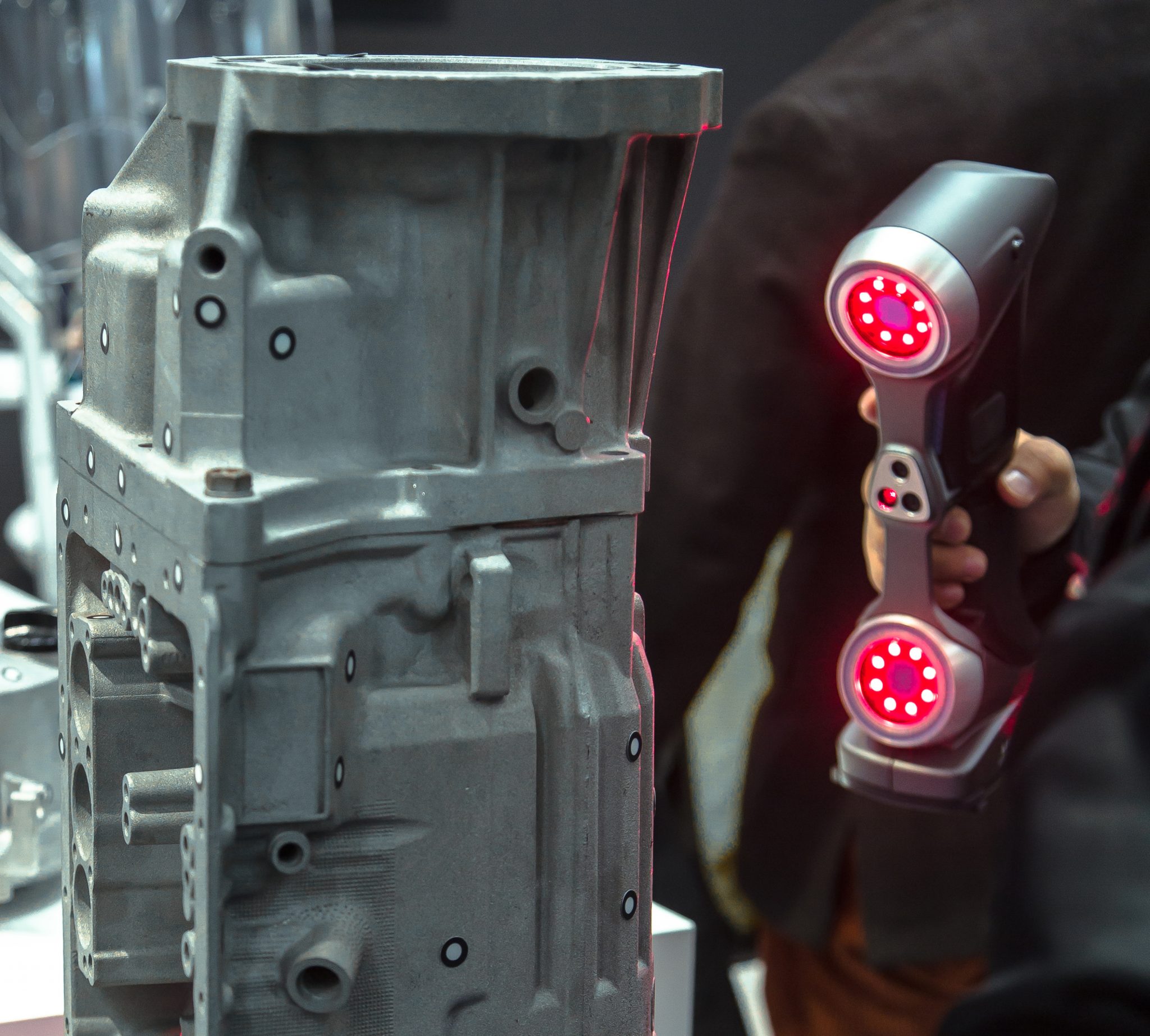 Engineer scans the part with 3D scanner. Technology scanning ...